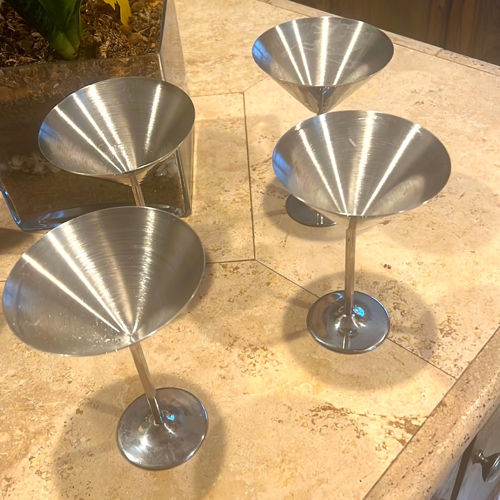 Stainless steel martini glasses set of four. SOLD AND WONT SEEM TO POST SOLD